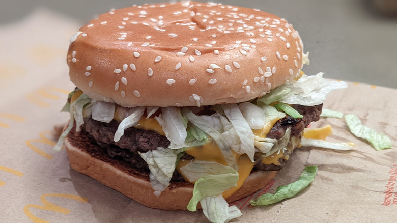 McDonald's Quarter Pounder With Cheese Deluxe on paper bag