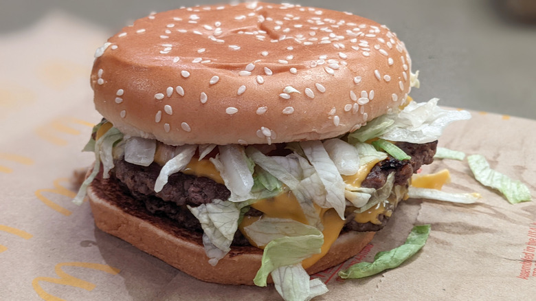 McDonald's Quarter Pounder With Cheese Deluxe on paper bag