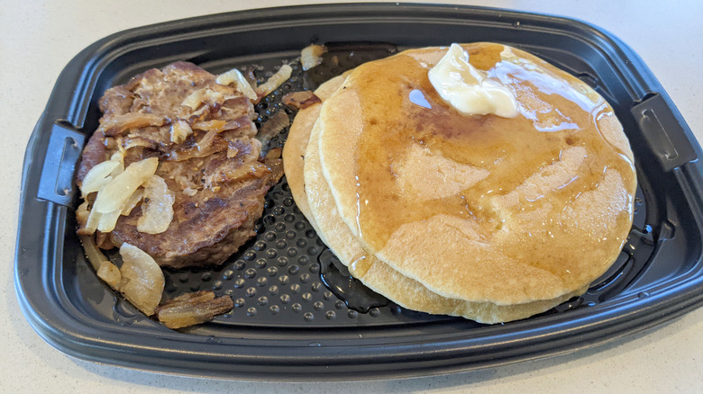 McDonald's Hotcakes with steak on plastic platter