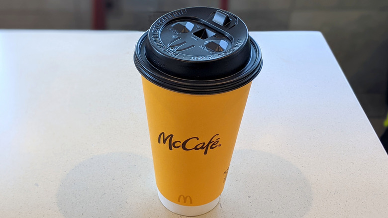 McDonald's coffee cup on table