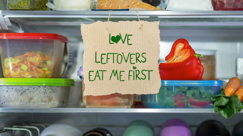 Leftovers in fridge with sign