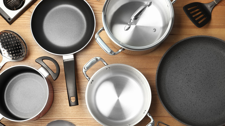 Pots and pans with utensils