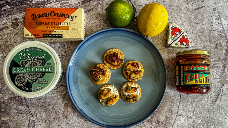 cracker snack with ingredients surrounding