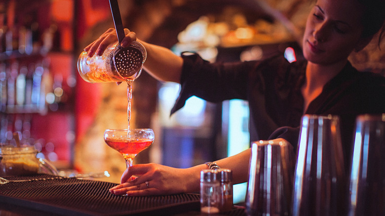 bartender pouring drink