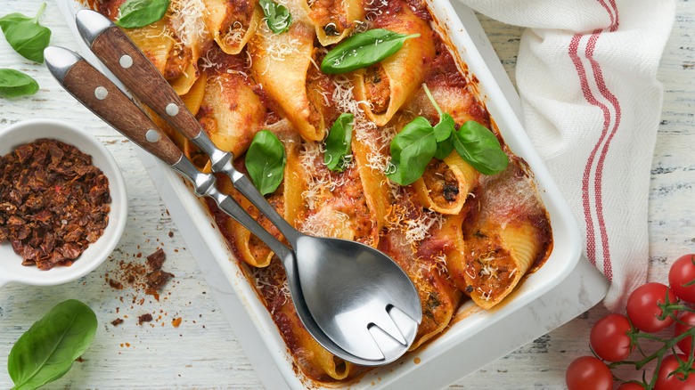 Stuffed pasta shells in baking dish