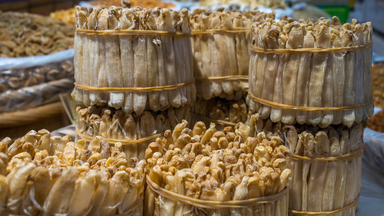 dried peanut worms in market