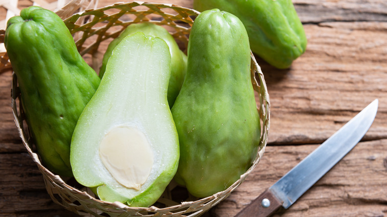 sliced chayote with knife