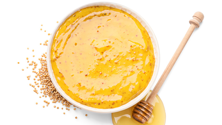 Small bowl of honey mustard.