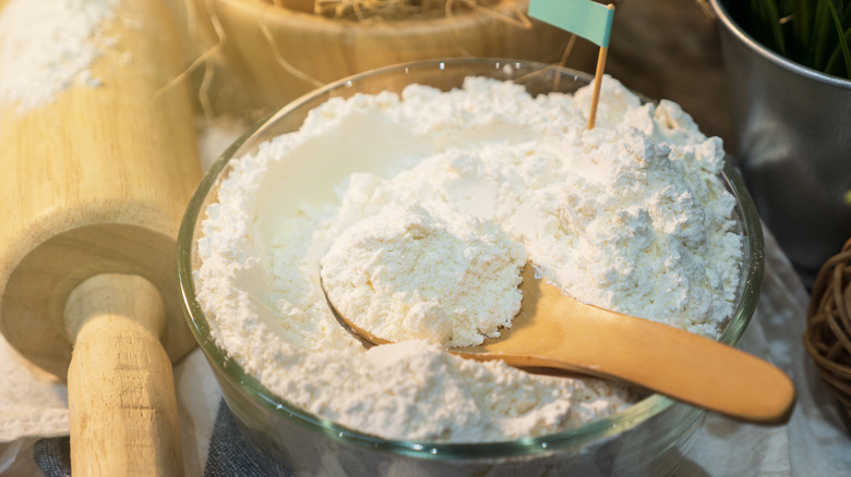 bowl of flour with rolling pin