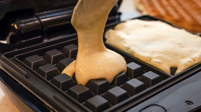batter poured into waffle iron