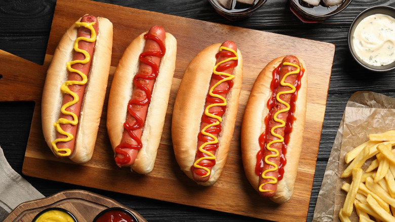 tray of hot dogs with ketchup and mustard