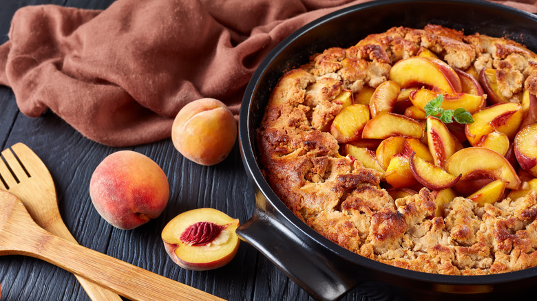 Homemade peach cobbler spiced with mace