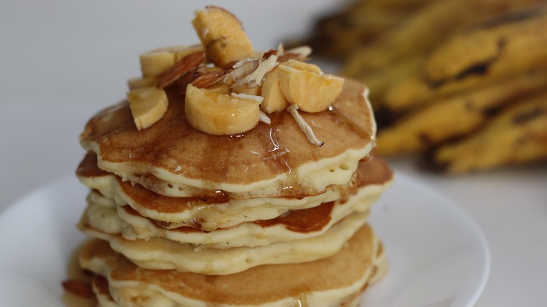 plantain pancakes stacked on plate