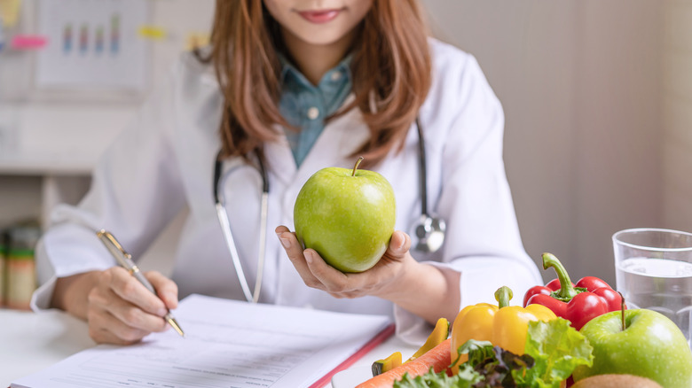 Nutritionist with produce