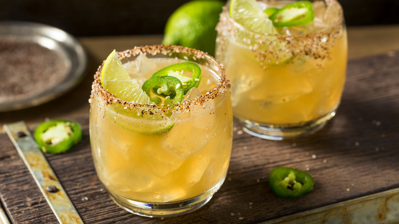 spicy margaritas in with lime and salt