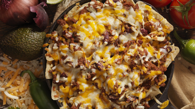 A skillet of cheesy nachos