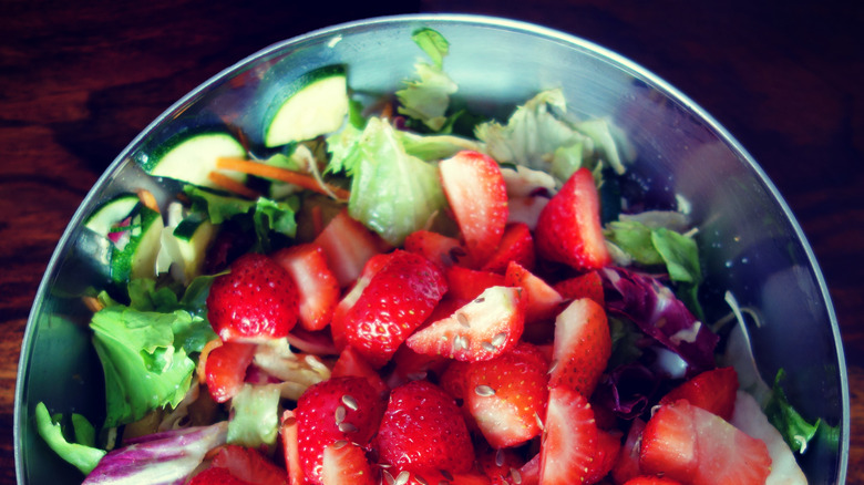 salad garnished with strawberries 