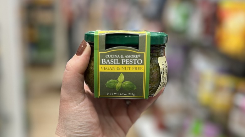 Jar of vegan basil pesto sauce