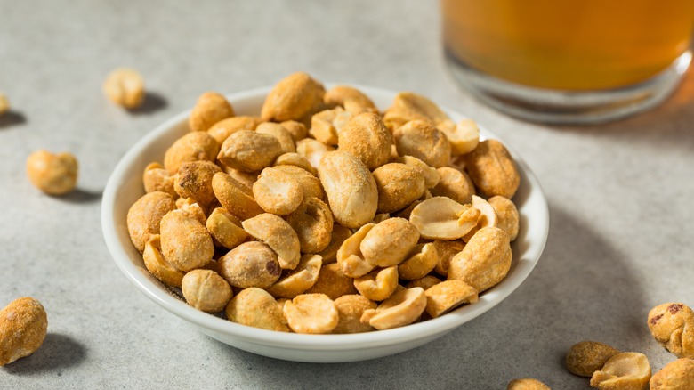 roasted peanuts in small bowl 