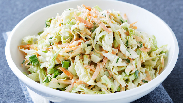 coleslaw in a white bowl