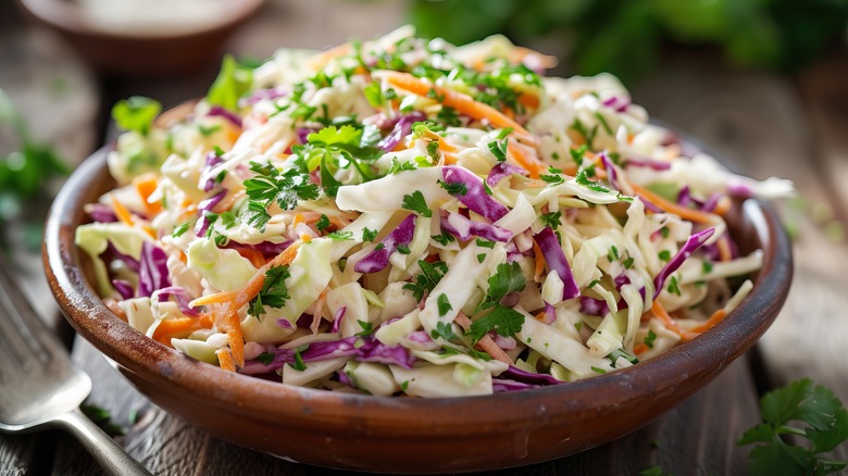 coleslaw in a wooden bowl