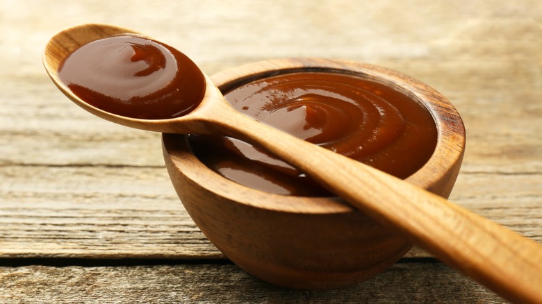 wooden bowl of barbecue sauce