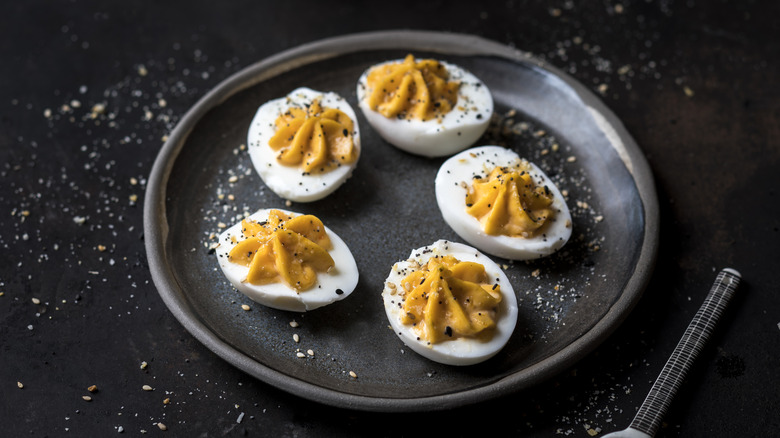 plate of five deviled eggs