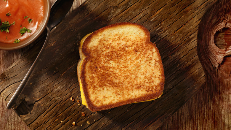 Grilled cheese on wooden board