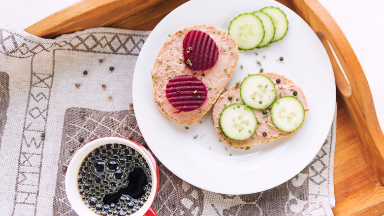 Liver pâté on bread on breakfast tray