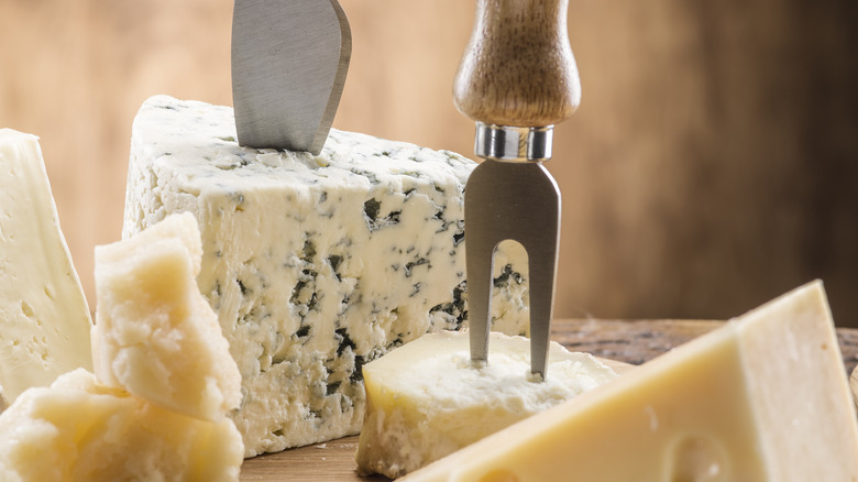 Cheeses on a wood board