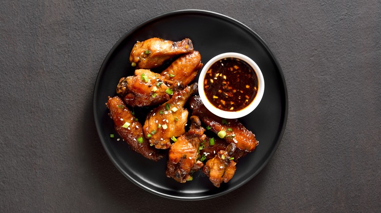 Korean fried chicken with sauce in bowl