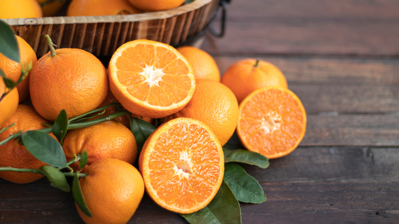 basket with cut oranges