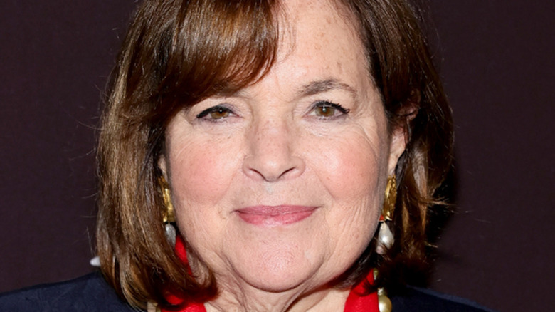 Ina Garten wearing red ribbon