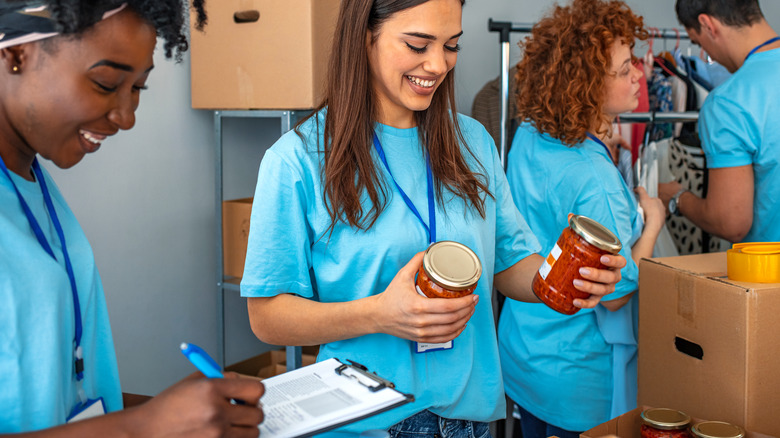 girls volunteering at food bank