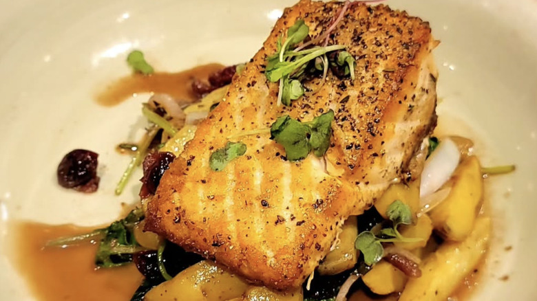 One Flew South's plated salmon dish