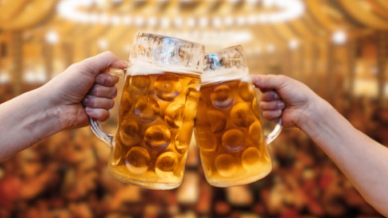 toasting beers at Oktoberfest