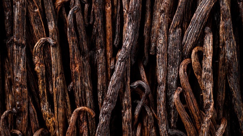 Dry cured whole vanilla beans up close