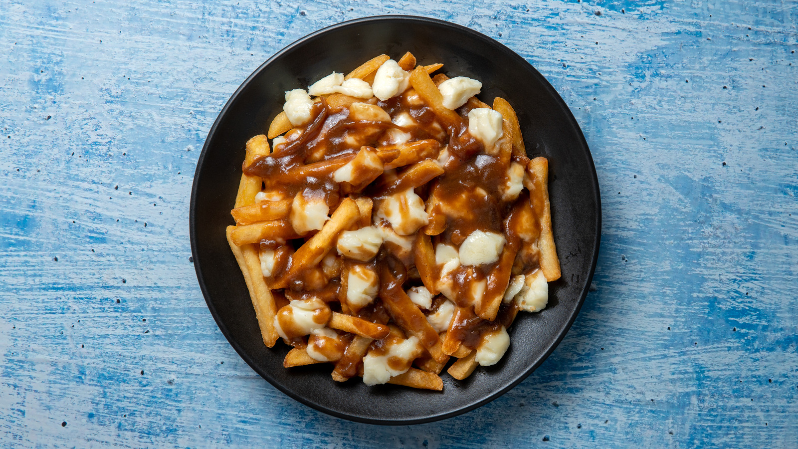 The Varied History Of Poutine, Canada's Unofficial National Food