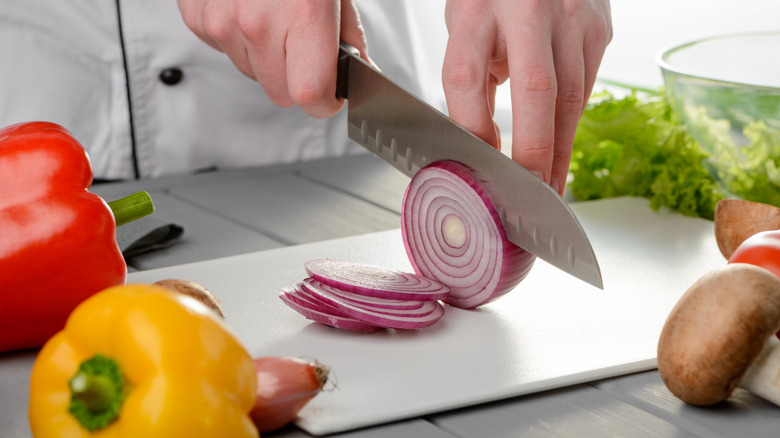 Slice red onion, bell peppers