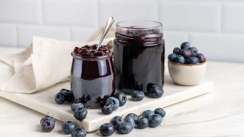 blueberry jam on a white countertop 