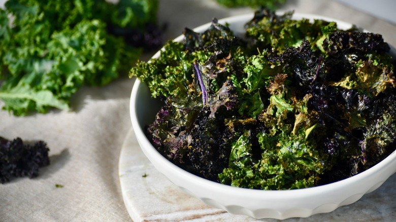 Kale chips in white bowl