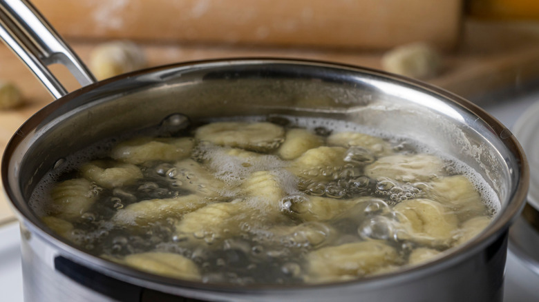 Gnocchi cooking in water