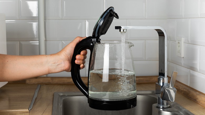 refilling electric kettle with water