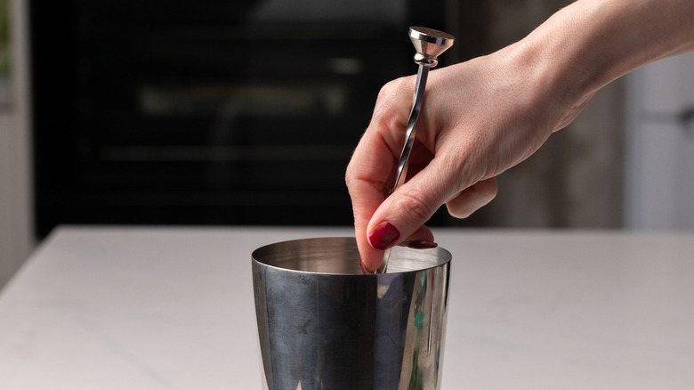 stirring martini in cocktail shaker