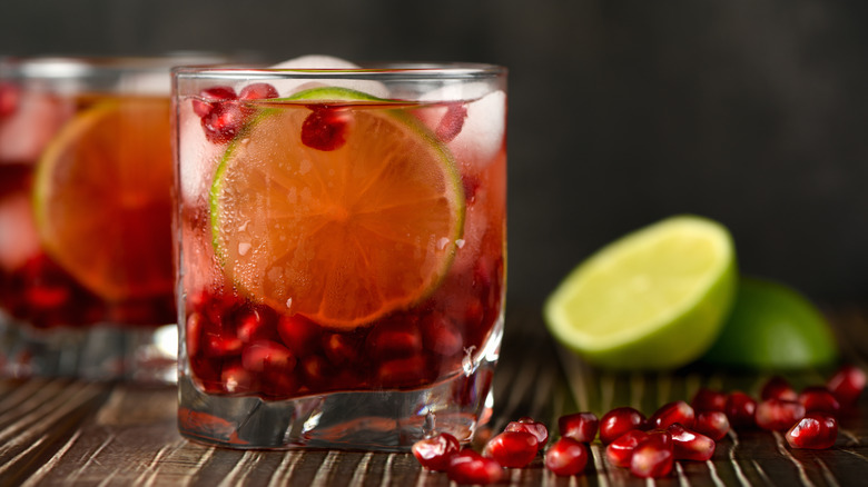 Pomegranate gimlet in a glass