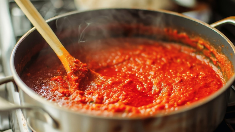 tomato sauce cooking in a pan