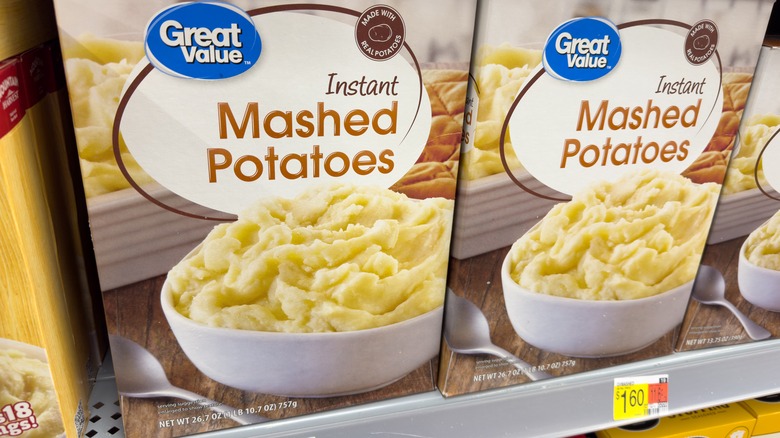 boxes of Great Value instant mashed potatoes on shelf