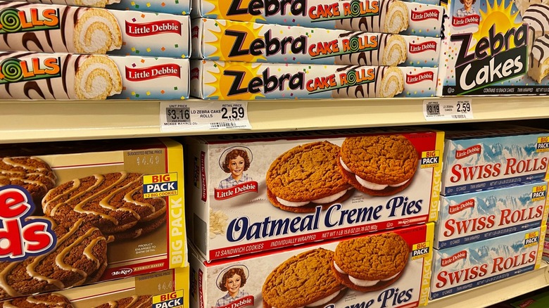 A variety of Little Debbie snack cakes on store shelf