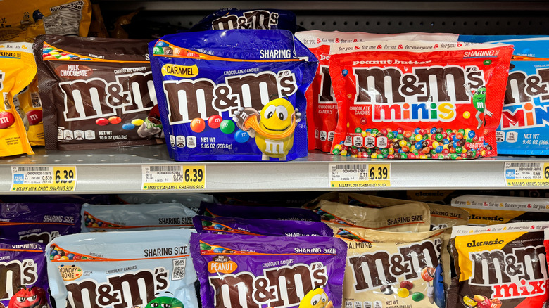 different flavors of M&ms on shelves