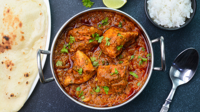 chicken tikka masala with naan and rice